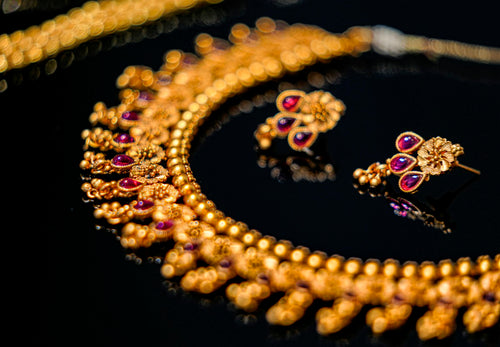 Gold and purple beaded necklace, beaded jewelry texture reference for anklet — placeholder image